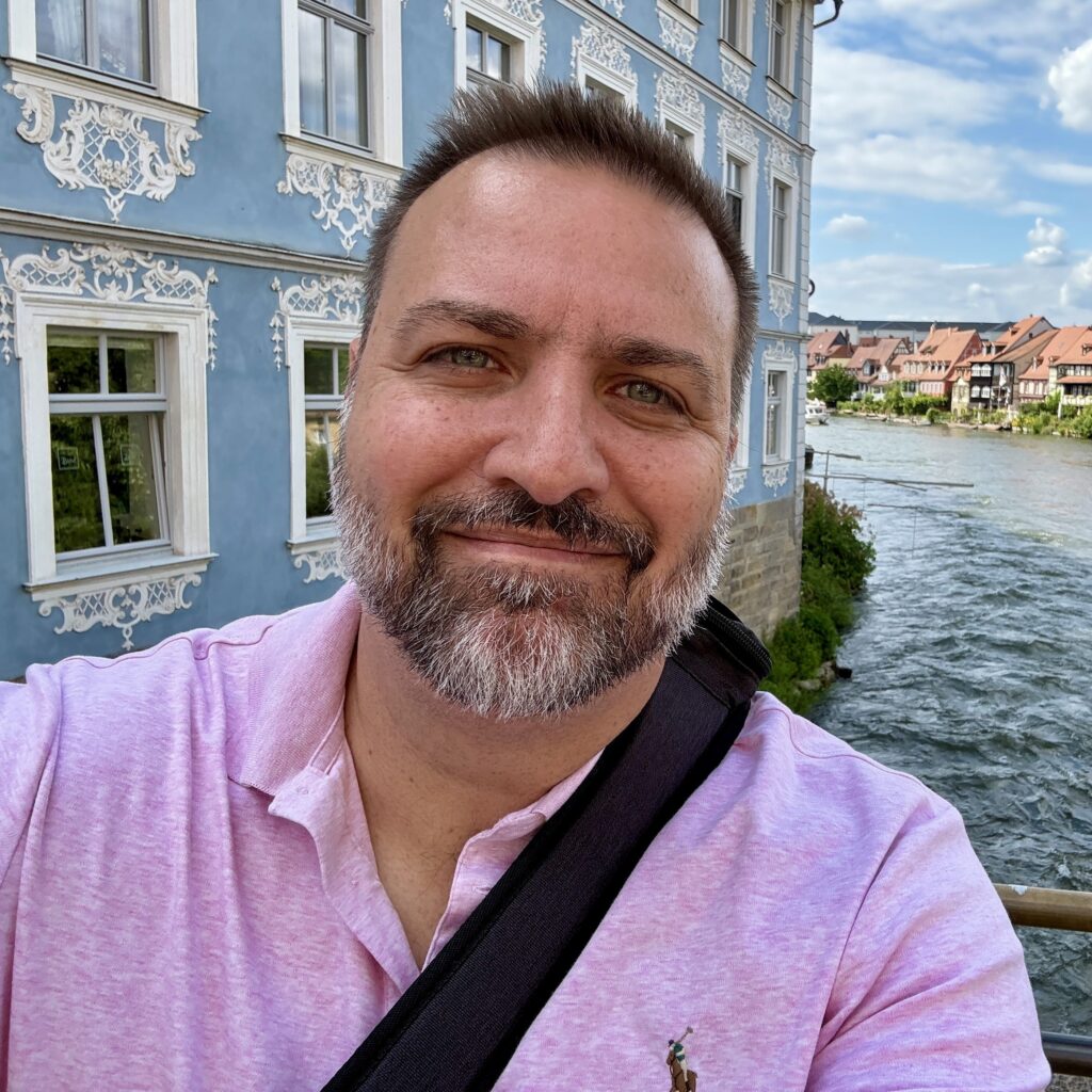 Amorak Huey in front of a river
